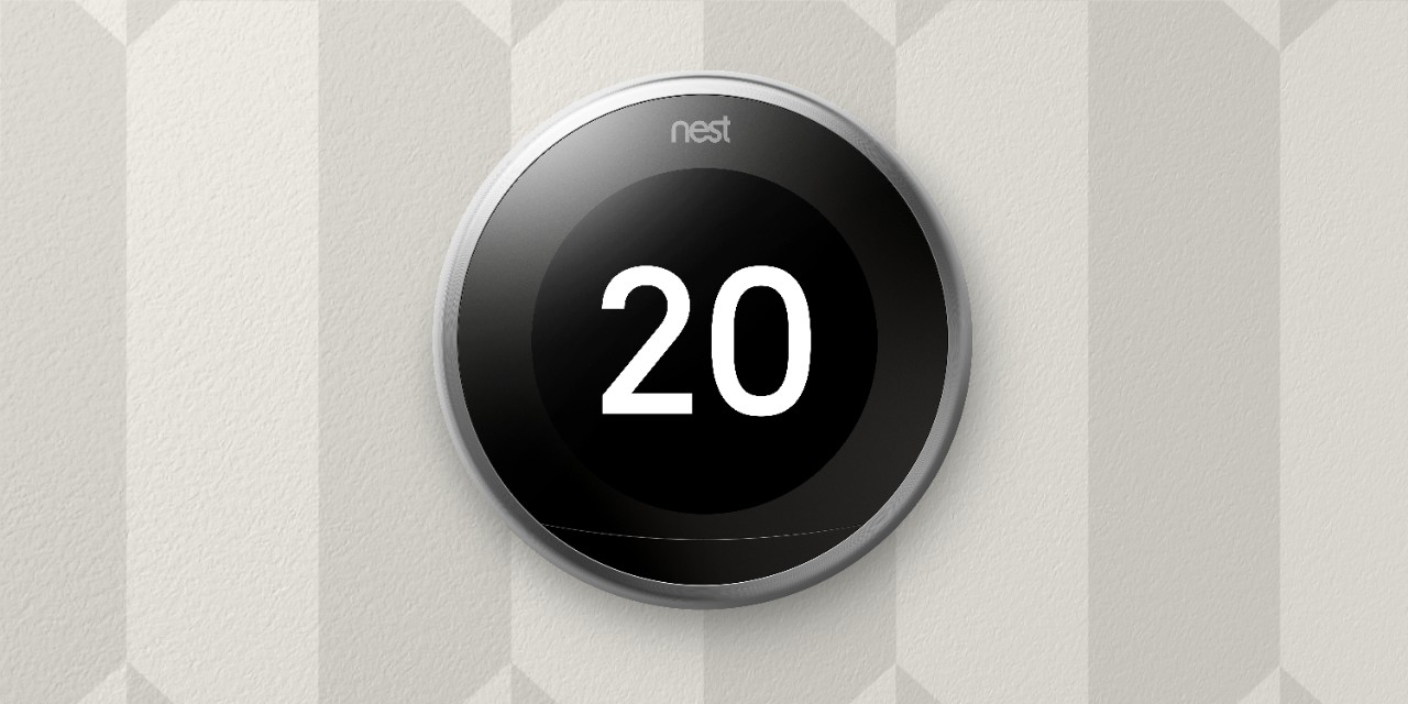 Nest slimme thermostaat aan de muur Nest slimme thermostaat aan de muur