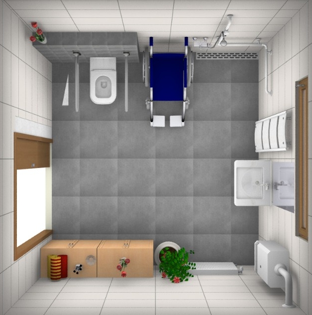 Vovenzijde rolstoelbadkamer met rolstoel naast het toilet voor een transfer Vovenzijde rolstoelbadkamer met rolstoel naast het toilet voor een transfer