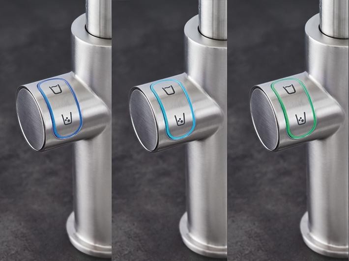 Op de knoppen geef je gemakkelijk aan wat voor water je wenst Op de knoppen geef je gemakkelijk aan wat voor water je wenst